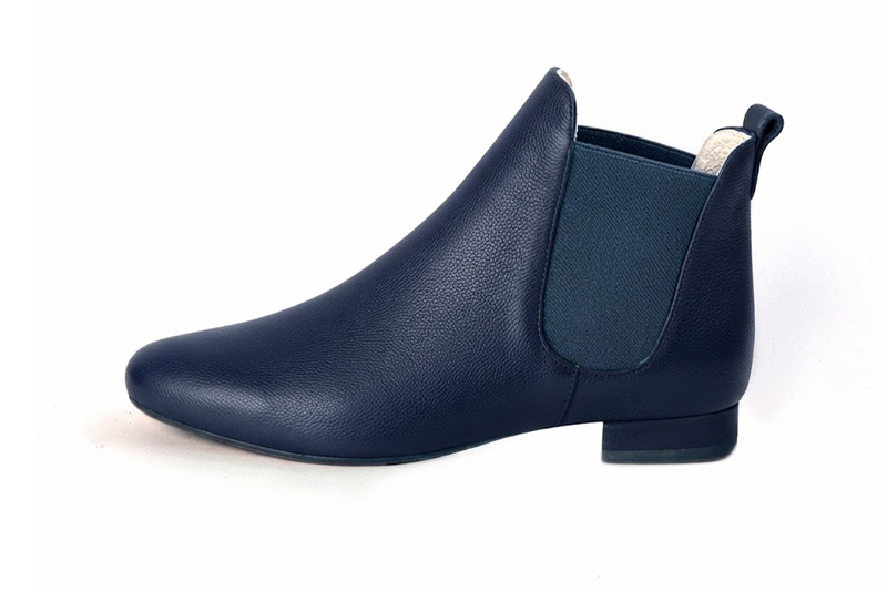 Elevate your look with solid-color leather Chelsea boots featuring sleek elastic side panels and effortless Parisian elegance, in navy blue leather with round toe and low block heel - Florence KOOIJMAN